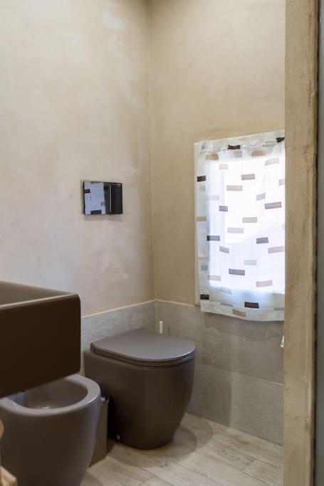 Casa Vacanze L'Angolo Fiorito Bettolle Buitenkant foto